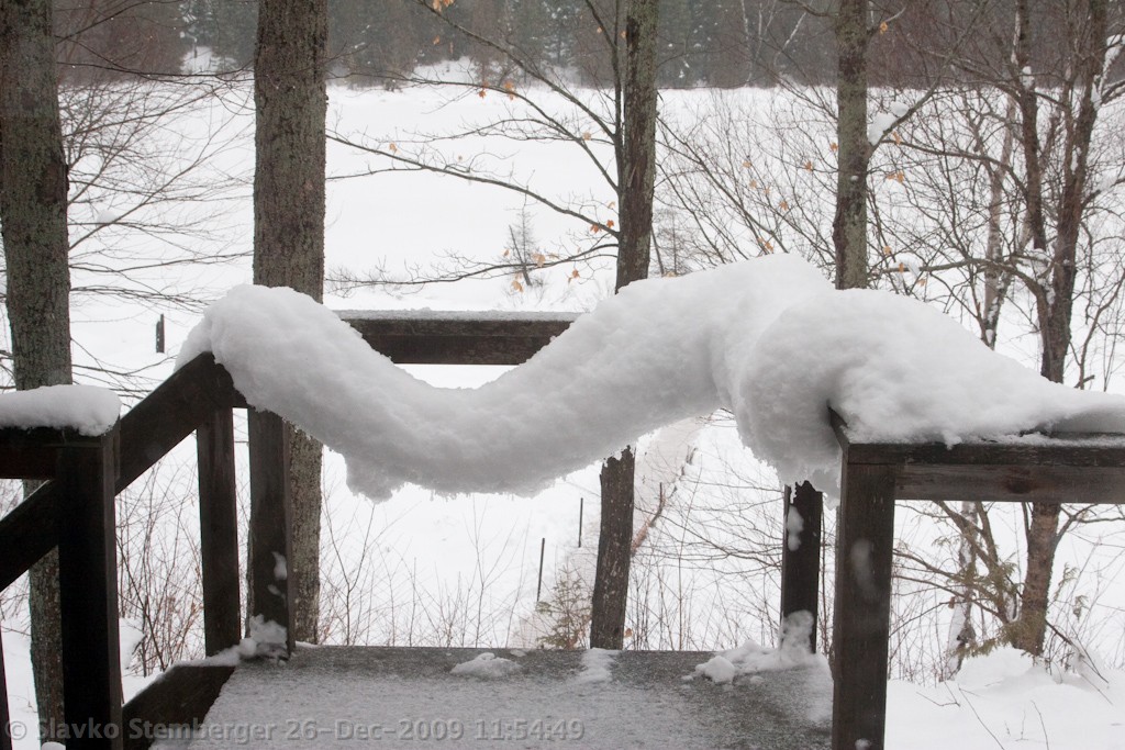 Snow ledge on railing